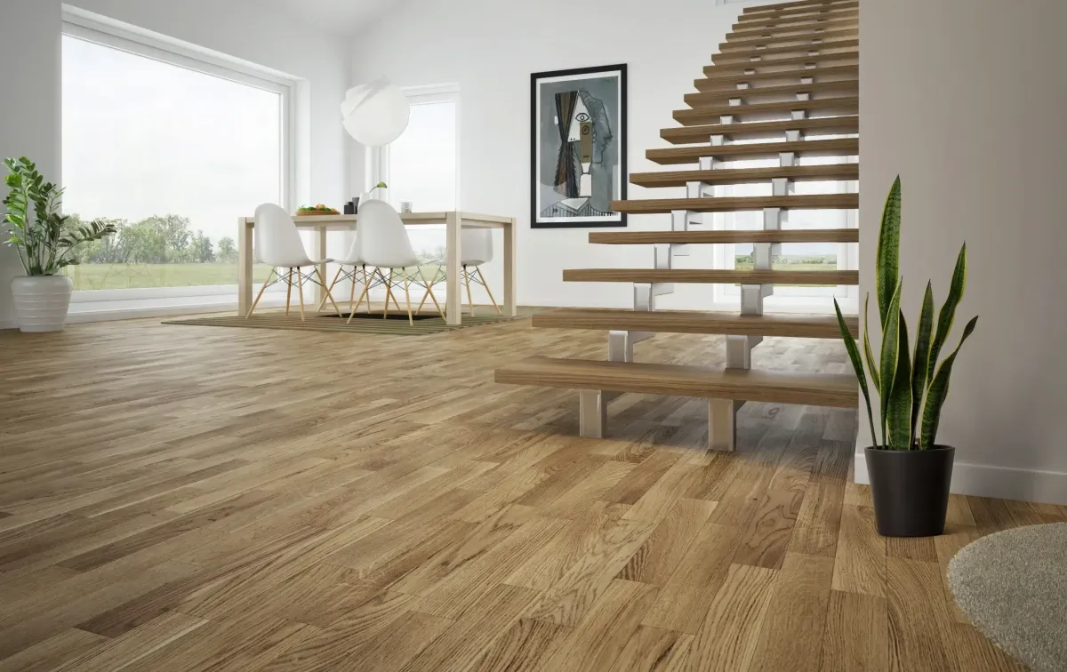 Freshly installed warm hardwood floor in a modern coastal interior with natural light, showcasing craftsmanship and elegance