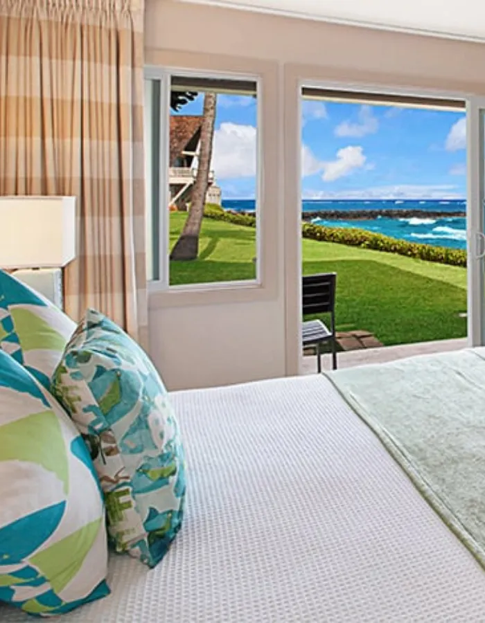 woman setting sheets on bed