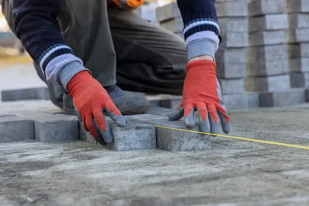 Image of a fence repair expert fixing a damaged picket fence - "Skilled fence repair technician repairing a picket fence."