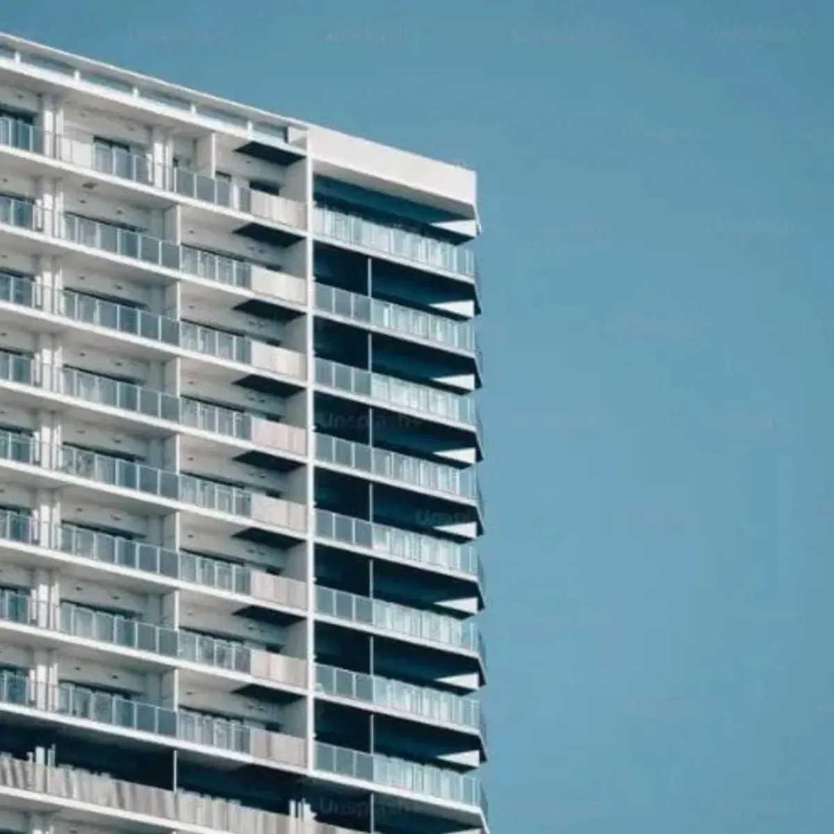 Modern building exterior under clear blue sky