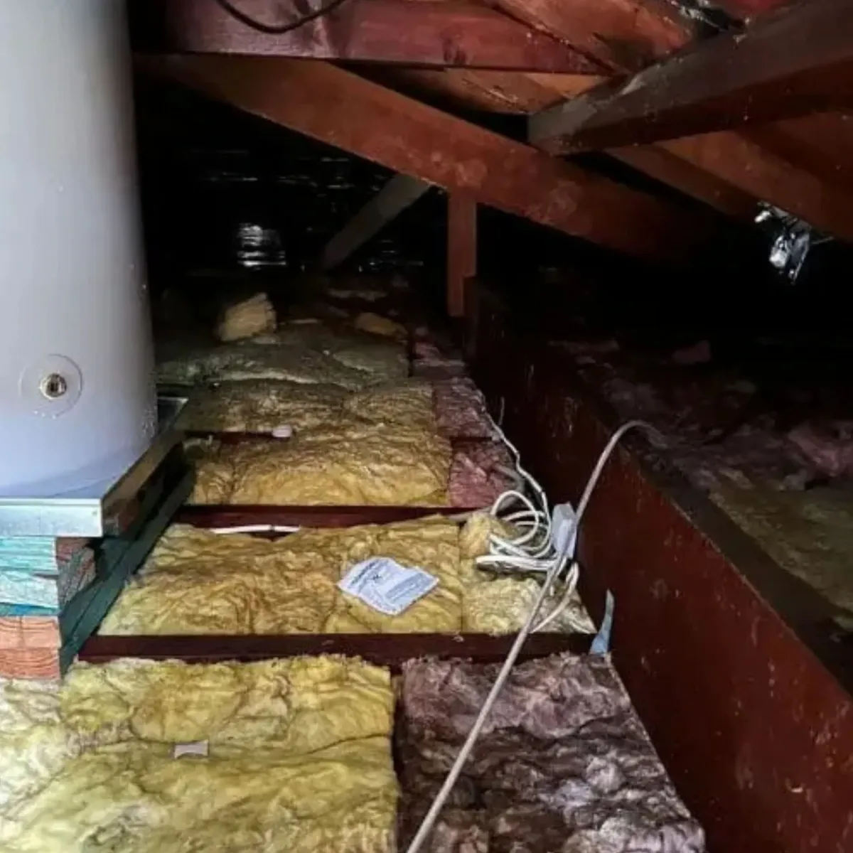 Attic space with insulation and drying equipment