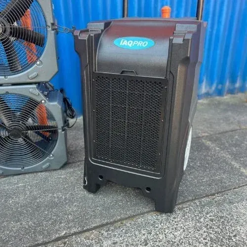 Professional dehumidifier unit for removing excess moisture after water damage.