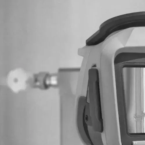 Infrared thermal imaging camera detecting hidden moisture in walls and ceilings.