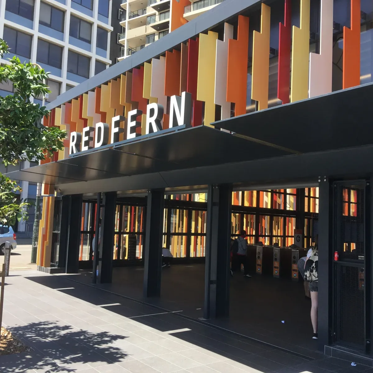 Redfern Station modern entrance, representing High Demand Restoration’s reliable flood, mould, and water restoration services throughout the Redfern and inner Sydney region.