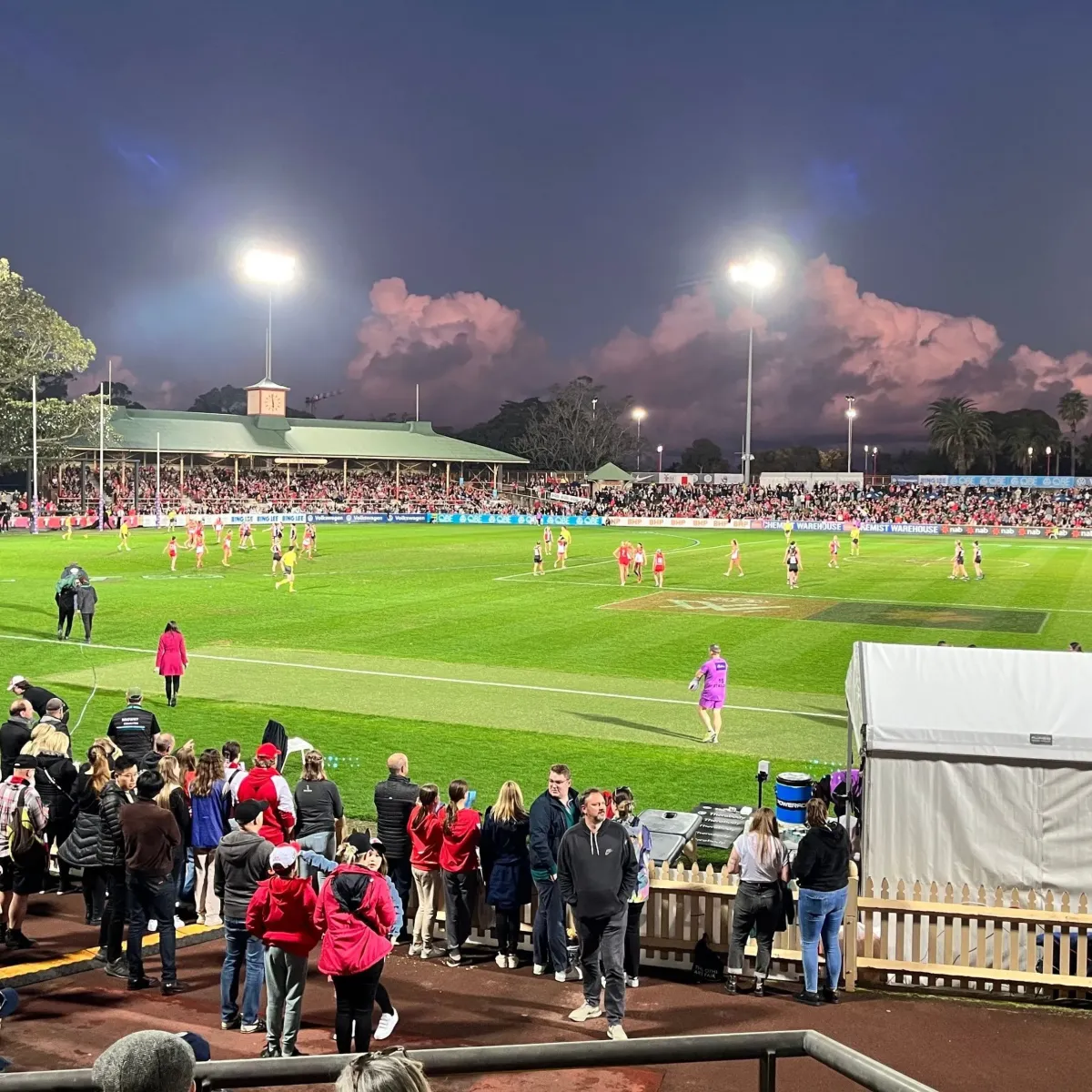 Sydney Cricket Ground during an evening match, representing Eastern Suburbs areas serviced by High Demand Restoration for flood, water, and mould restoration.