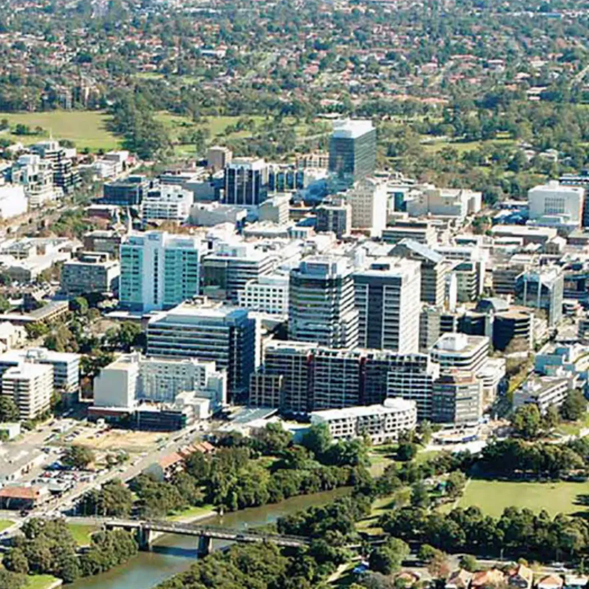 Aerial view of Parramatta’s modern cityscape, showcasing High Demand Restoration’s expertise in flood, mould, and water damage restoration throughout Greater Western Sydney.