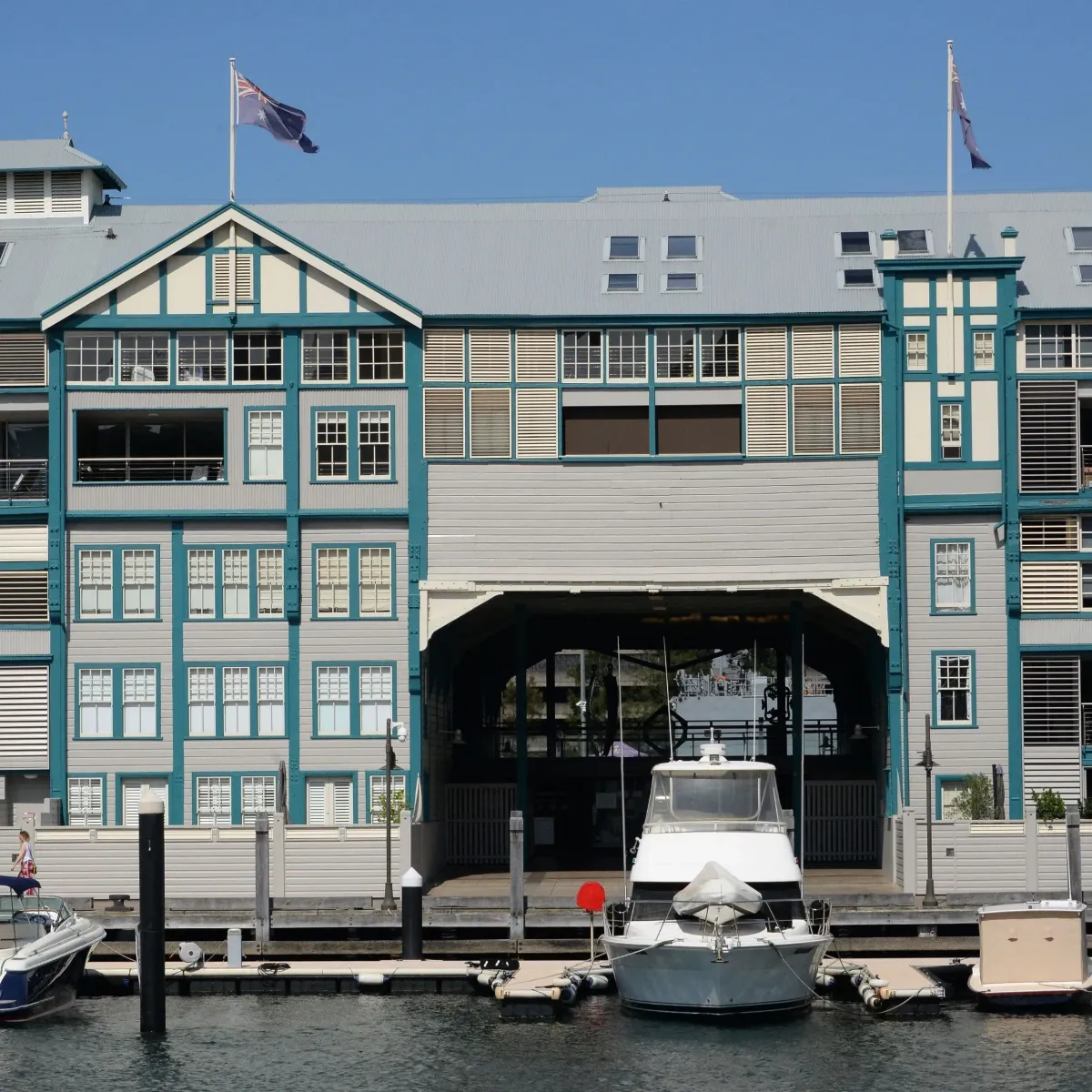 Woolloomooloo Wharf with moored boats, highlighting High Demand Restoration’s expertise in flood, mould, and water restoration for coastal and waterfront Sydney properties.