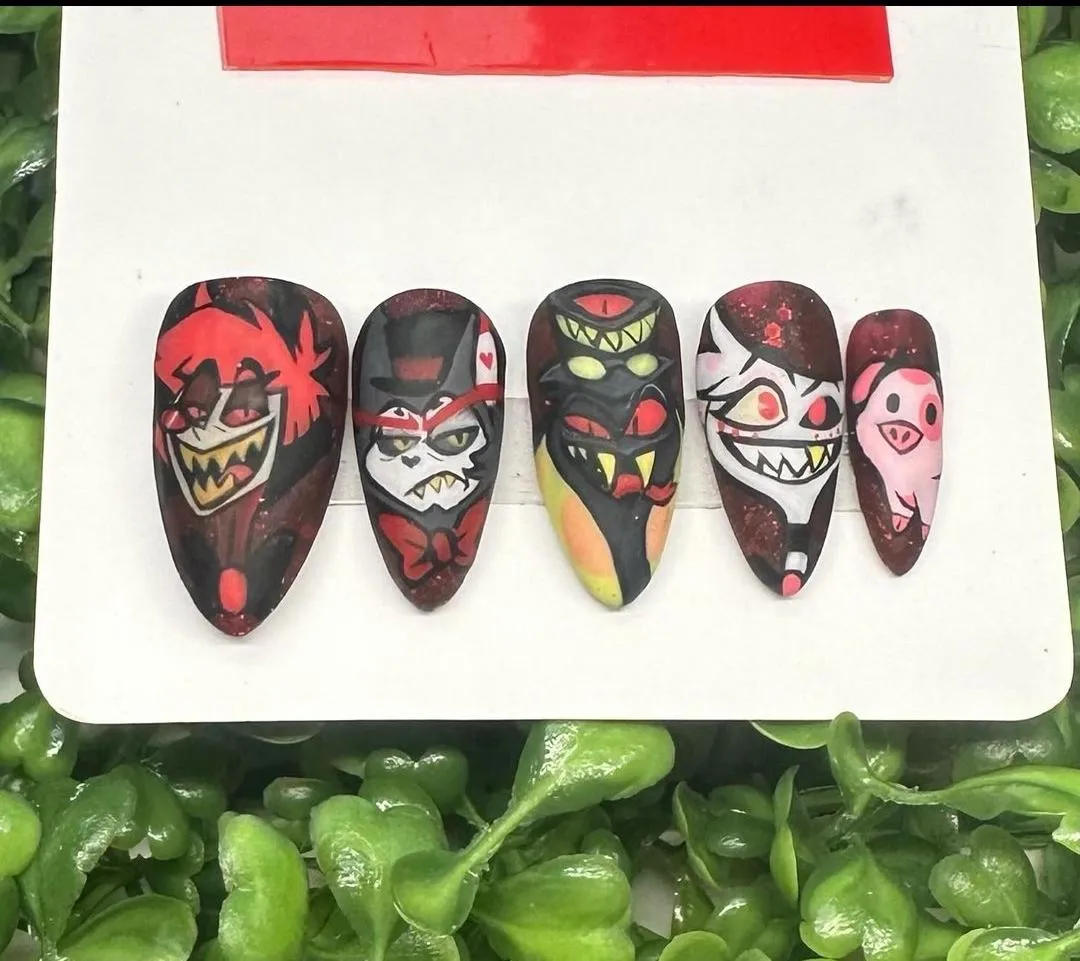 A set of Hazbin Hotel inspired nails