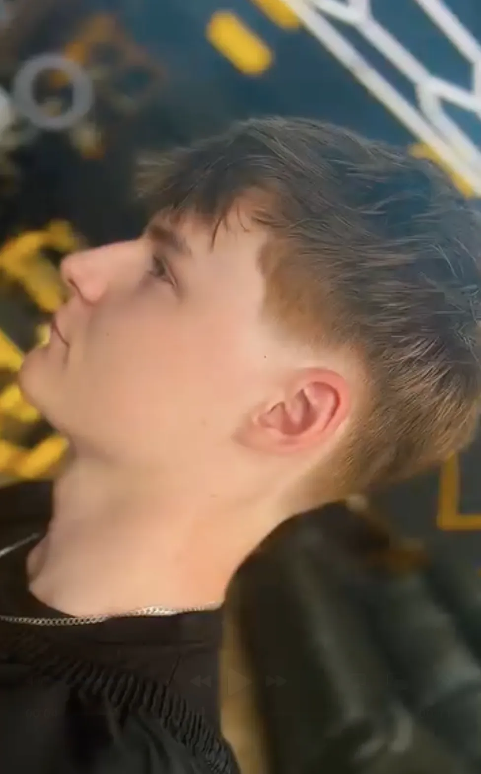 Profile of a customer having low taper fade haircut