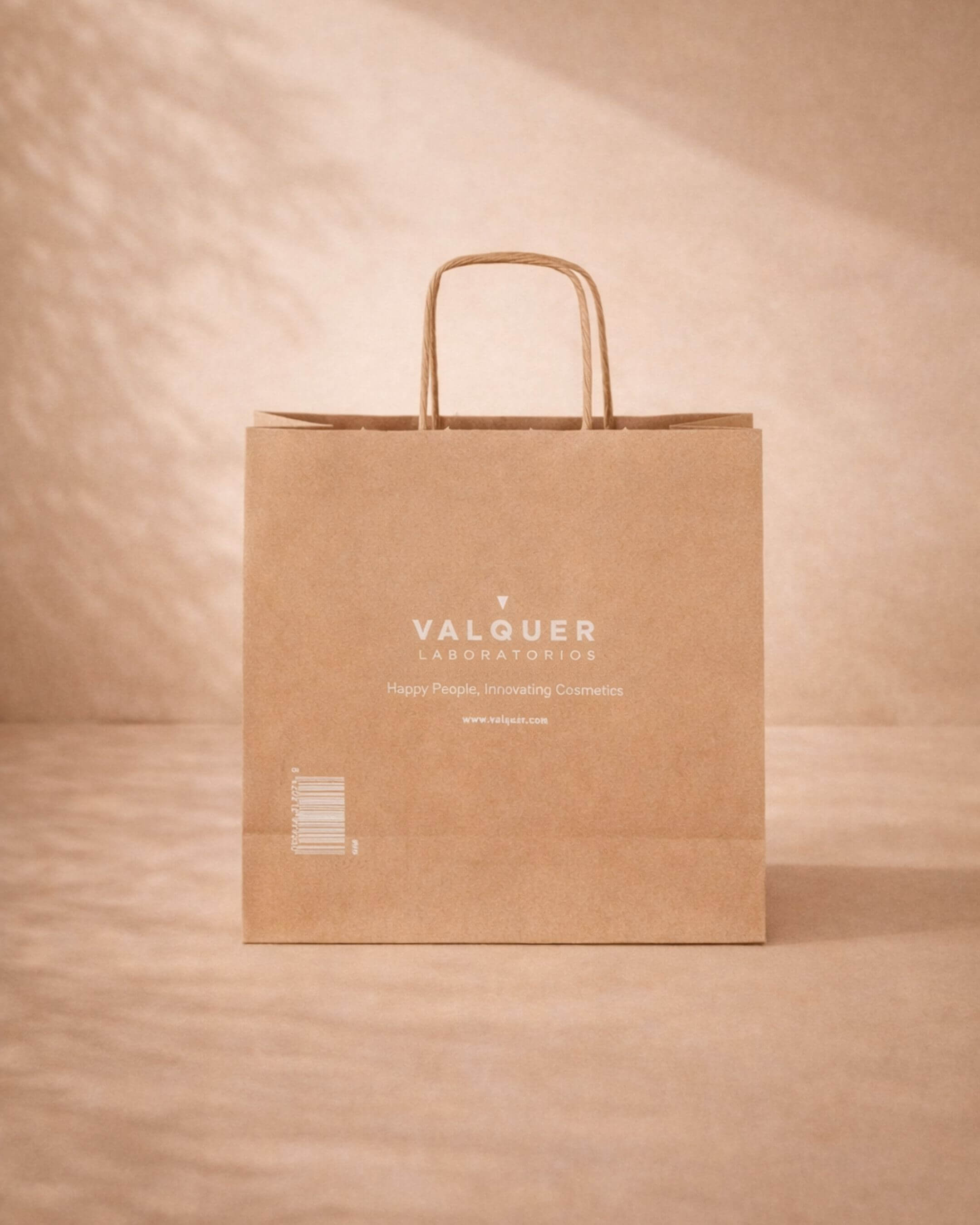 two clear glass jars with brown and black beads