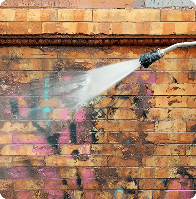 pressure washing brick wall removing stains and buildup in Dallas Texas