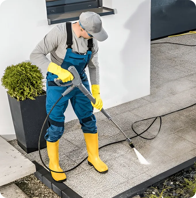 professional power washing service cleaning residential walkway and exterior surfaces in Dallas TX