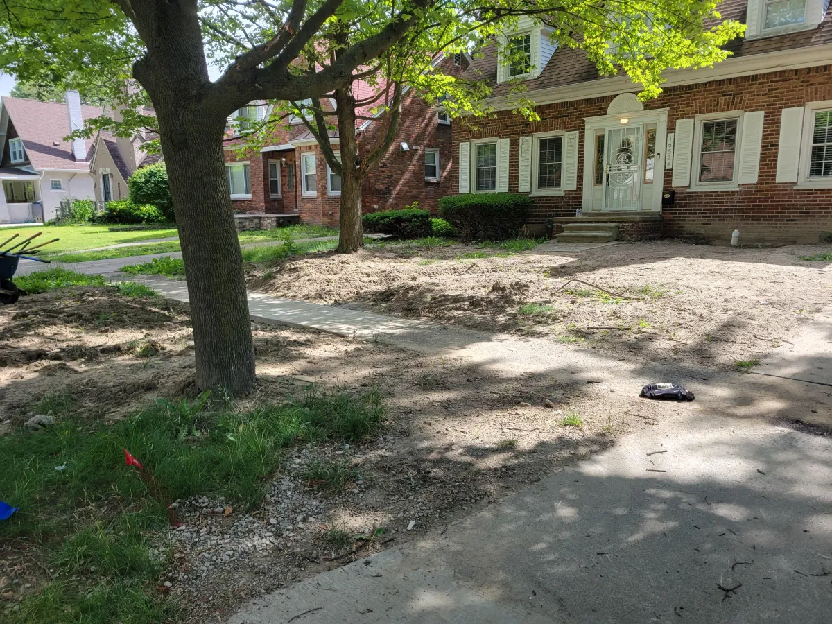 Before Landscaping Design/Installation n the front yard of a brick home in Dearborn, MI 