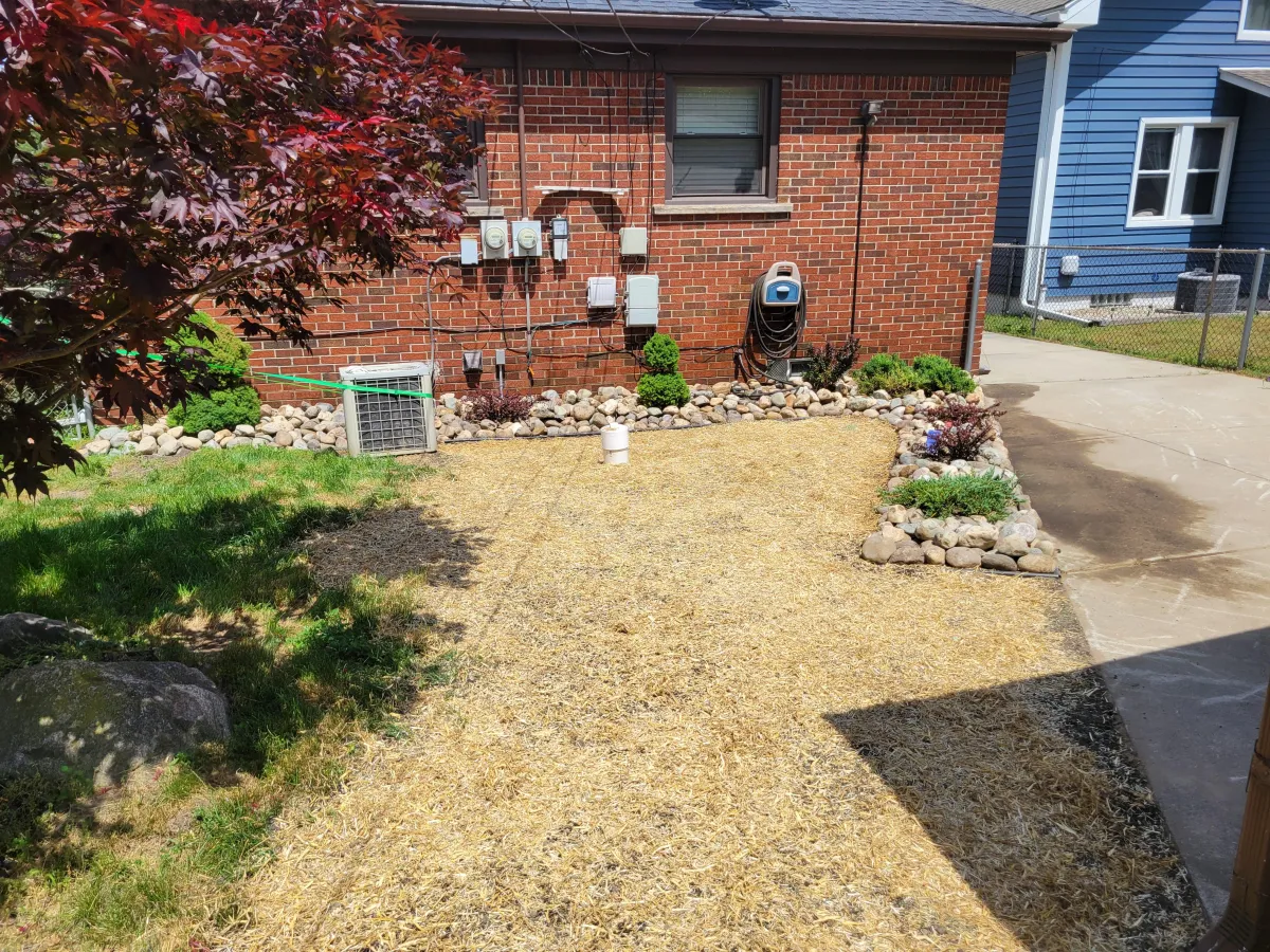 After Landscaping Installation for a brick home in Dearborn, MI