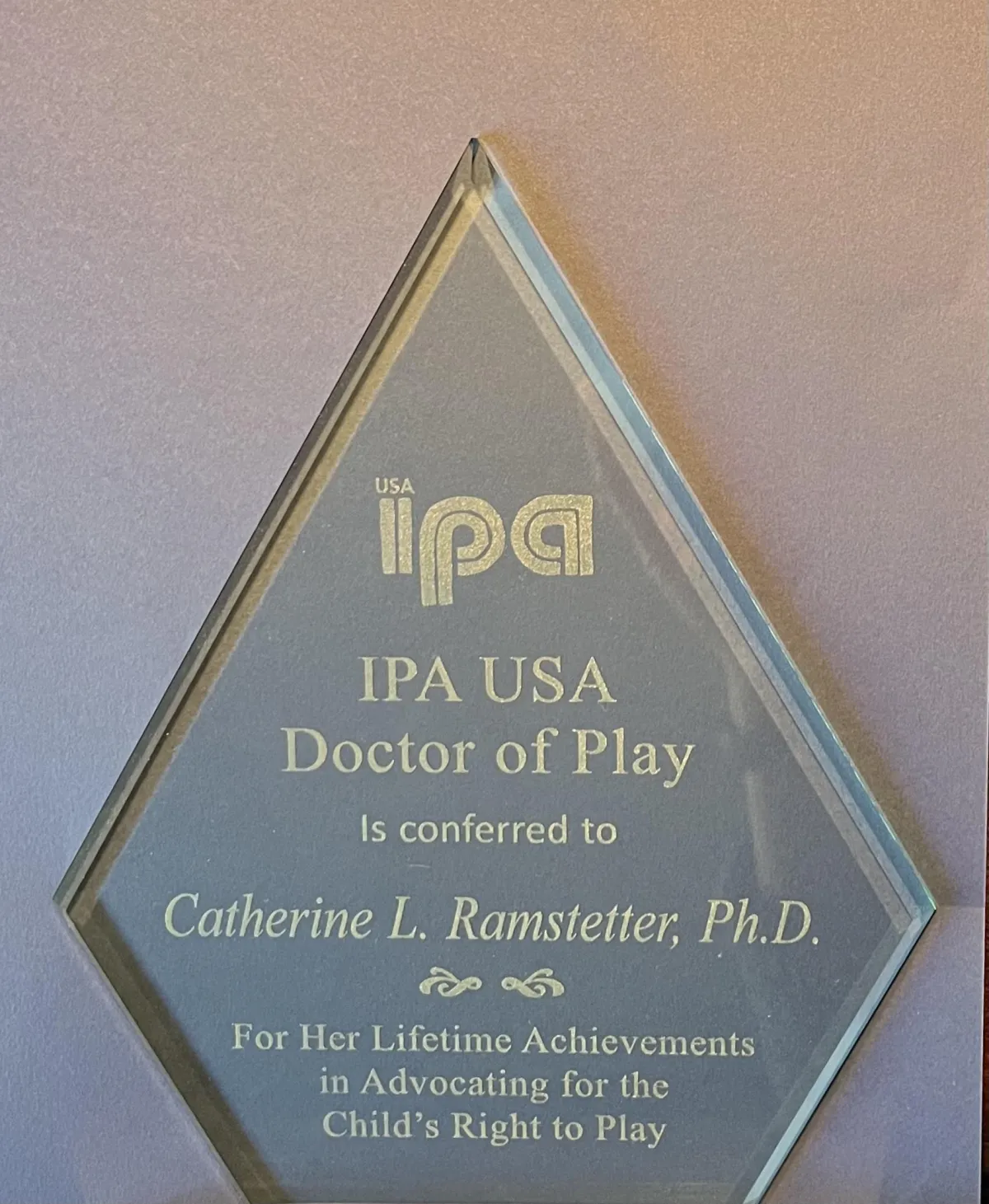 Dr. Catherine L. Ramstetter, PhD, receives IPA USA Doctor of Play award for advancing children's right to play.