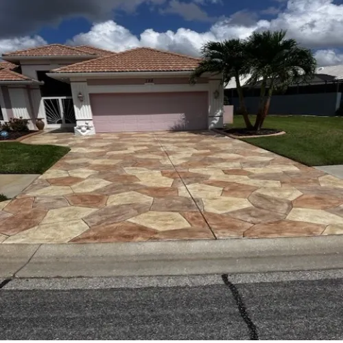 Resurfaced concrete patio in Sarasota, FL with smooth overlay and modern decorative finish.