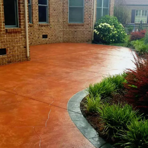 Decorative stained concrete floor with rich color finish inside a Sarasota, Florida home.