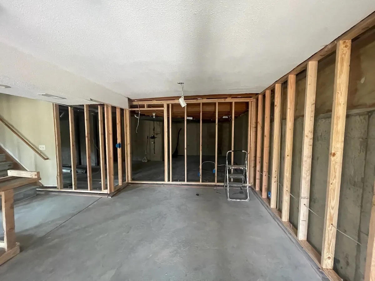 Basement wall framing during a basement finish by Mile High Remodel