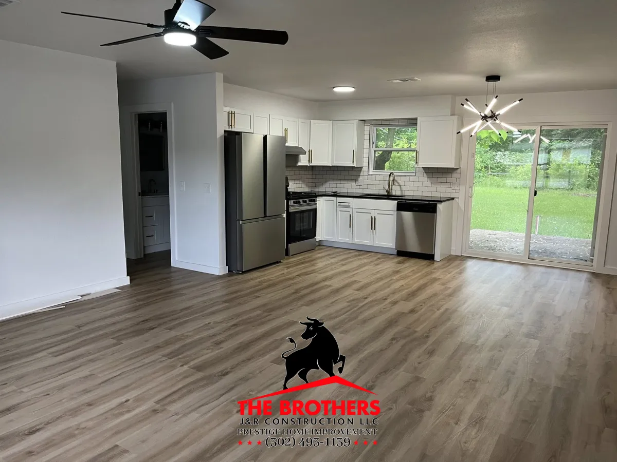 Interior home remodeling with open kitchen and flooring installation in Lewes DE