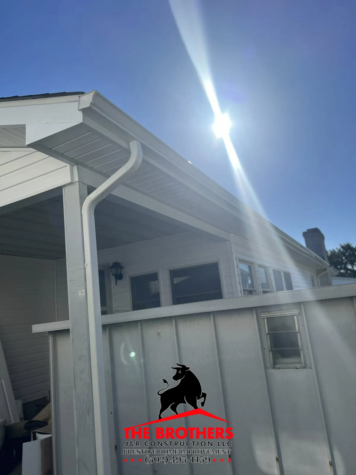 Exterior siding installation and roofing detail on residential home in Lewes DE