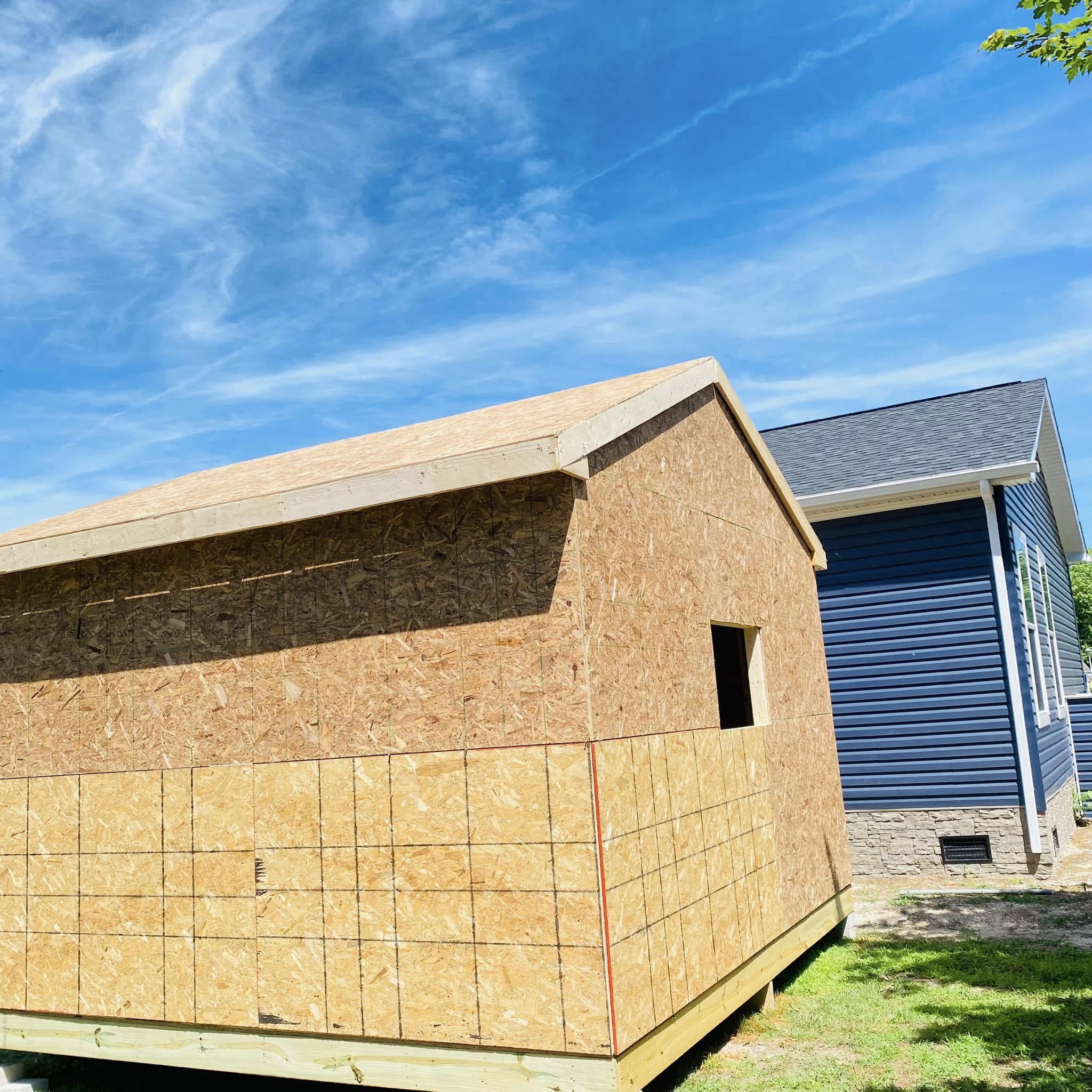 New home framing structure with plywood exterior in Lewes Delaware construction project