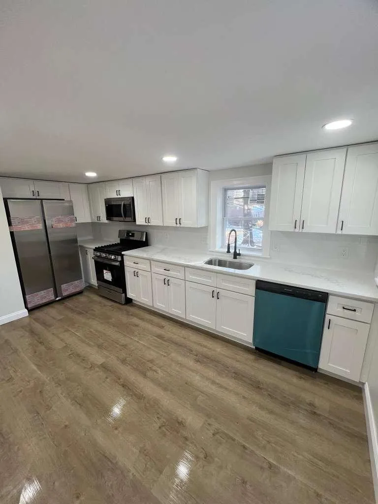 man holding incandescent bulb