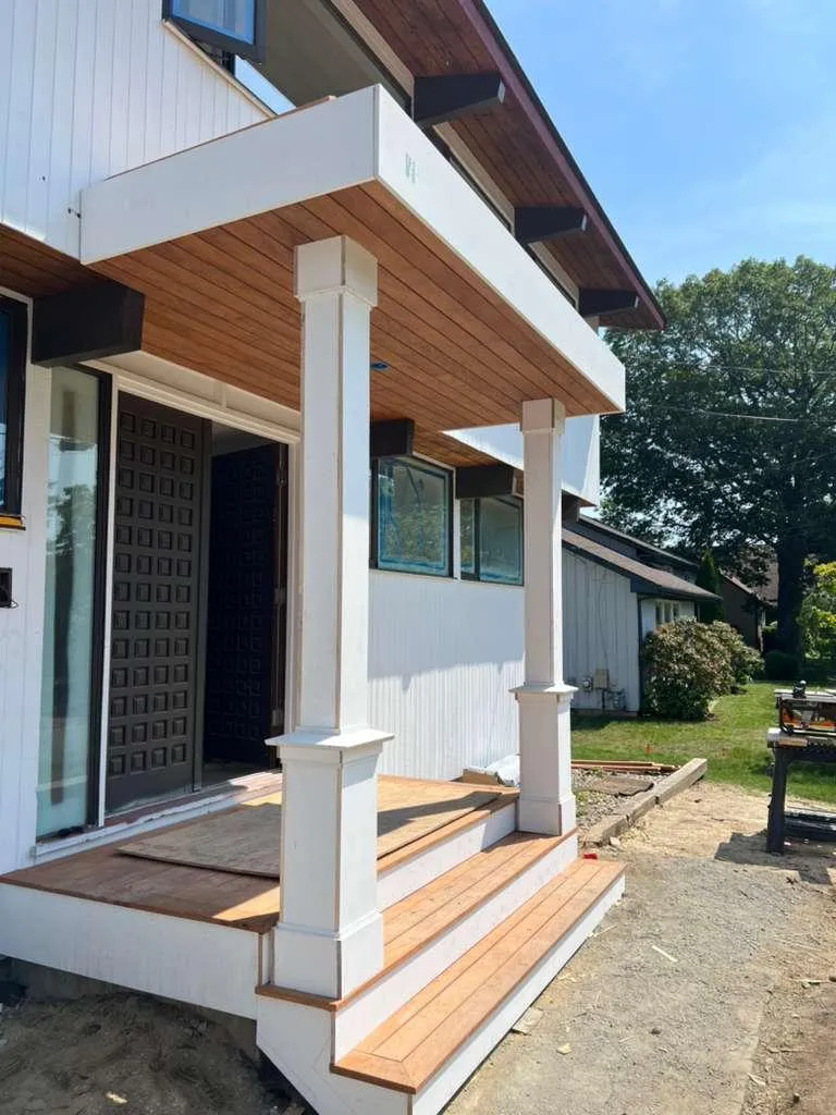 white robot near brown wall