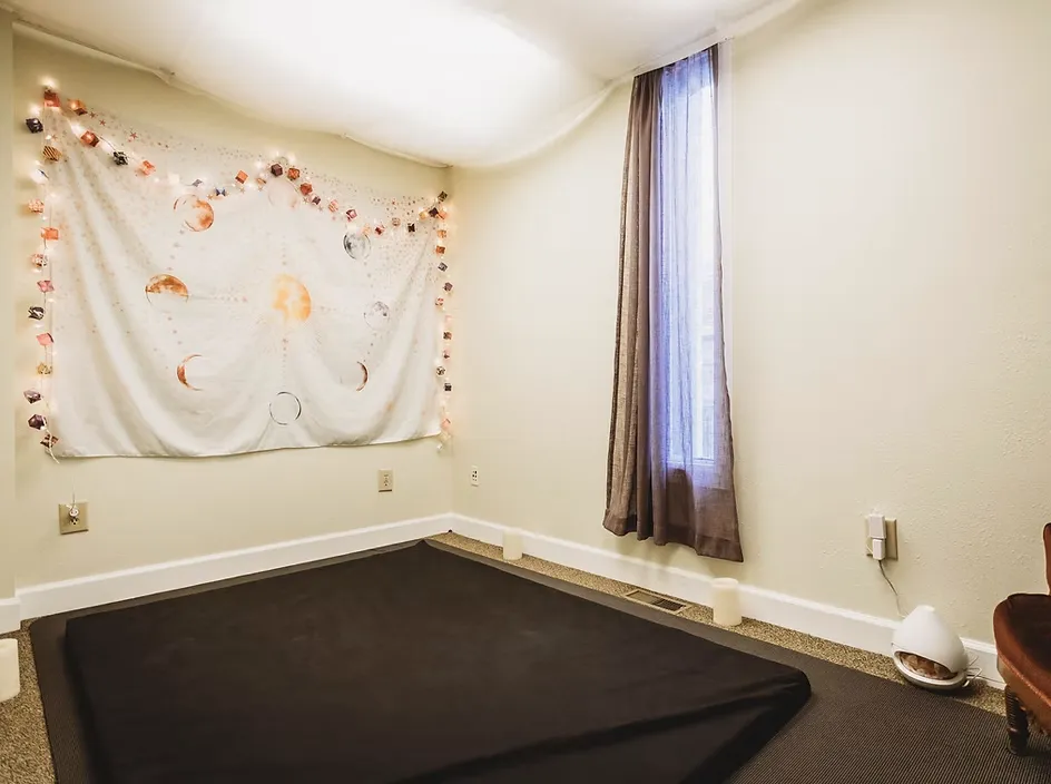 Soft-focus photo of a serene sound healing setup inside SAKALA