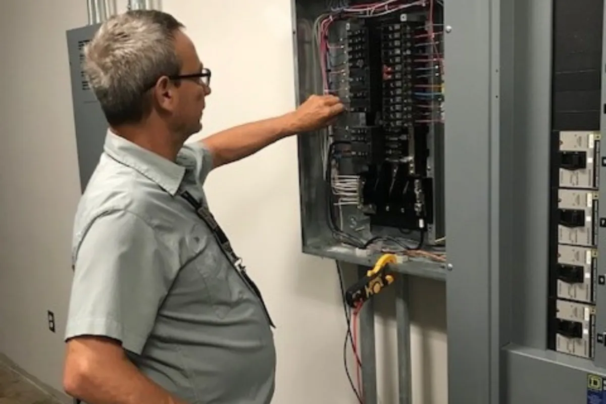 Electrical service work at a breaker panel