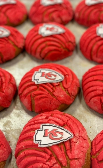 Rustic loaf and sliced pan de campo on a wooden board
