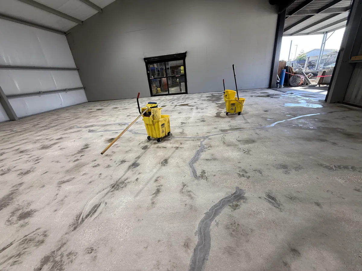 gray concrete building under white clouds