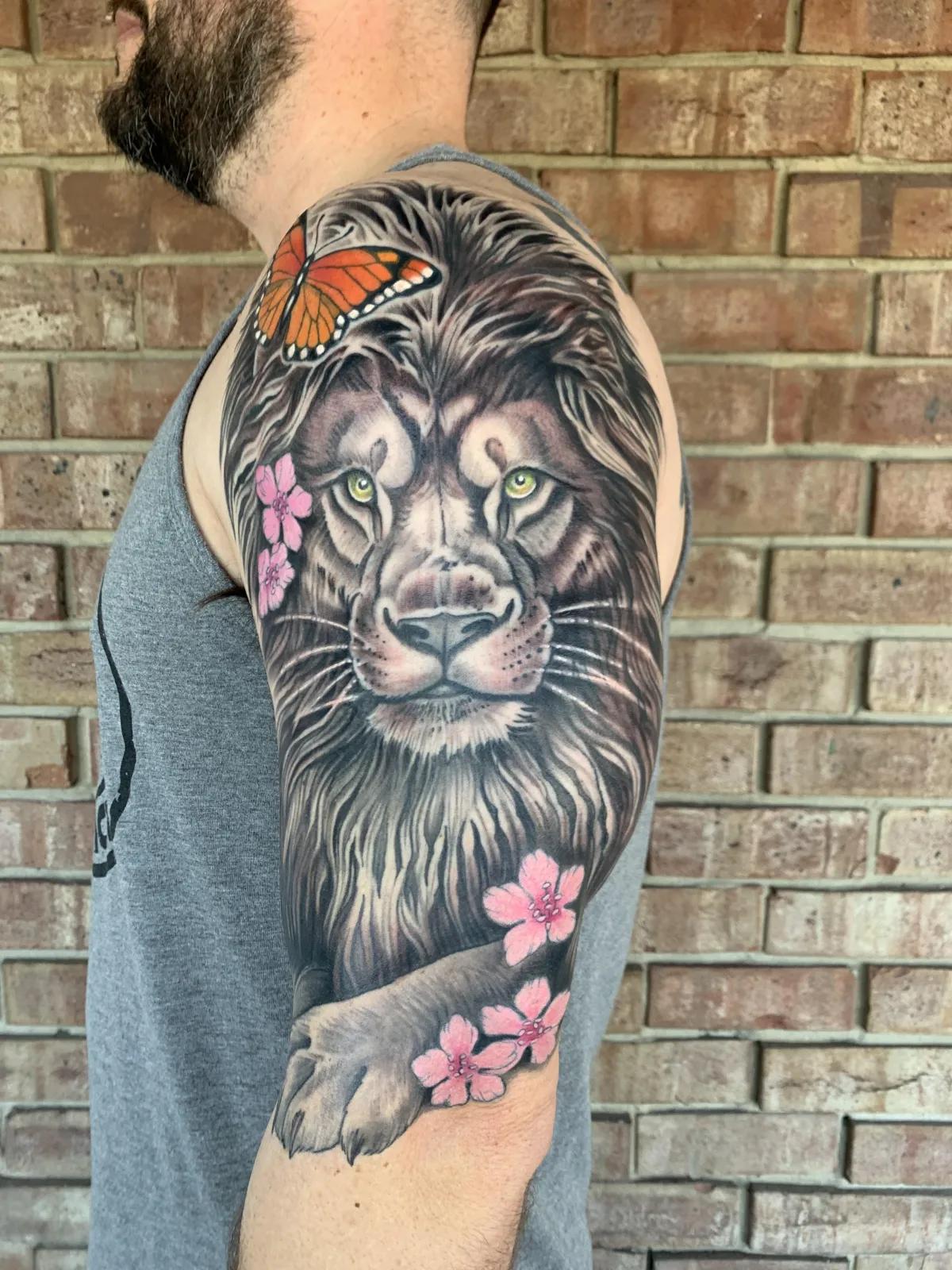 Intricate metatron's cube tattoo on a forearm, fresh black-dotwork lines with subtle grey shading; studio light casts soft highlights, photorealistic, close-up three-quarter angle to emphasize symmetry and crisp geometry.