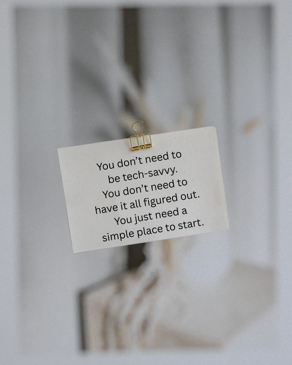 Note hanging on a window with a message about starting where you are and not needing to have it all figured out