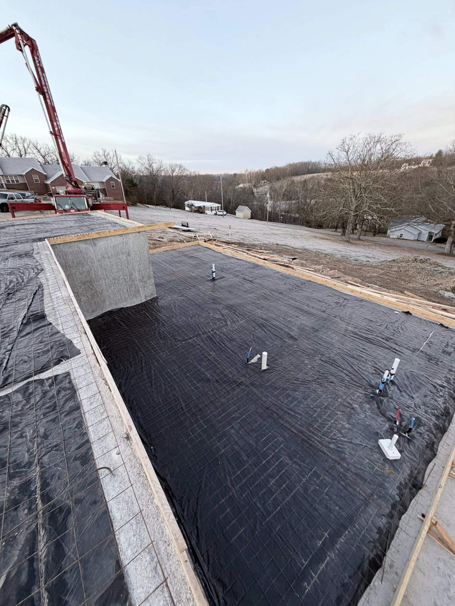 Concrete foundation walls with reinforced rebar installed by TRS Concrete & Hardscapes LLC in Springdale AR