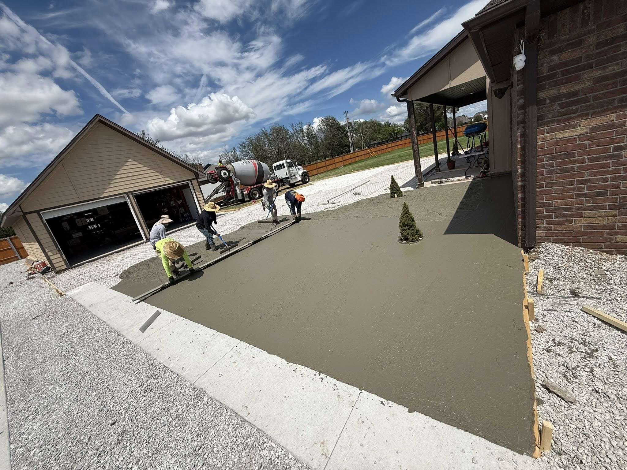 Concrete replacement project by TRS Concrete & Hardscapes LLC removing and pouring new driveway slab in Springdale AR