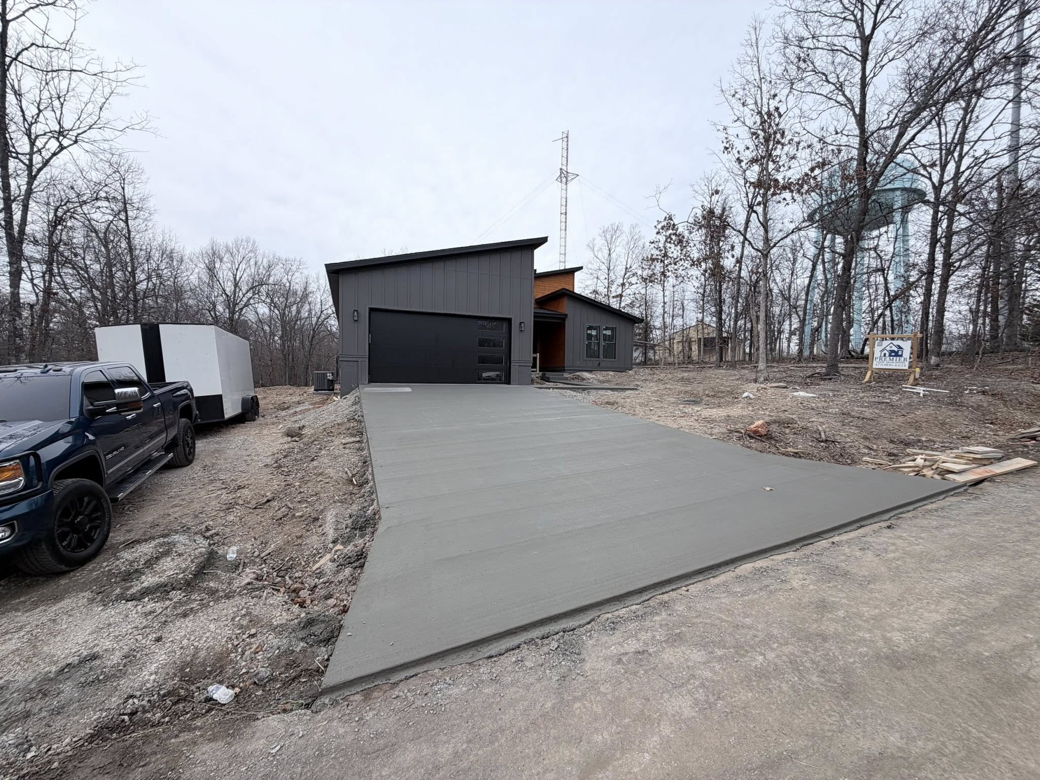 Concrete driveway installation in Springdale AR by TRS Concrete & Hardscapes LLC