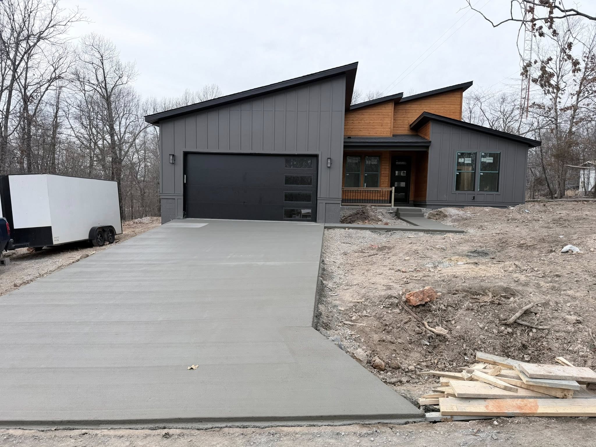 New concrete driveway installation in Springdale AR – residential concrete contractor Northwest Arkansas