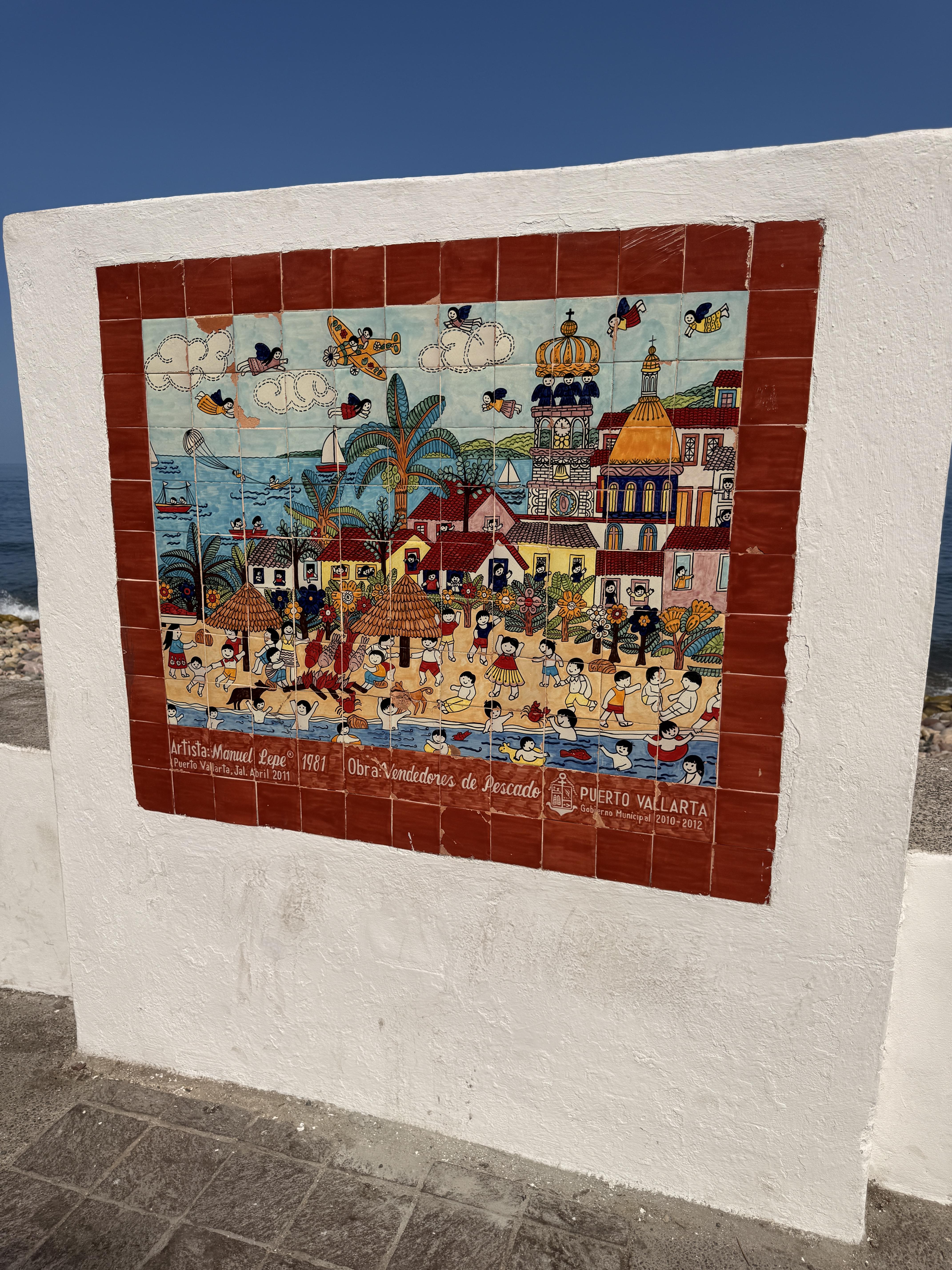 Vendedores de Pescado" from 1981 — is a colorful and charming hand-painted ceramic tile artwork depicting Puerto Vallarta's beach life