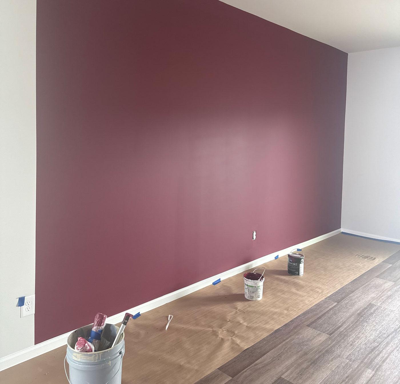Freshly painted burgundy accent wall in a residential interior by Camellia Painting Company in Summerville SC