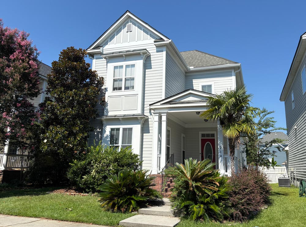 Freshly repainted home exterior with updated curb appeal by Camellia Painting Company in Summerville SC