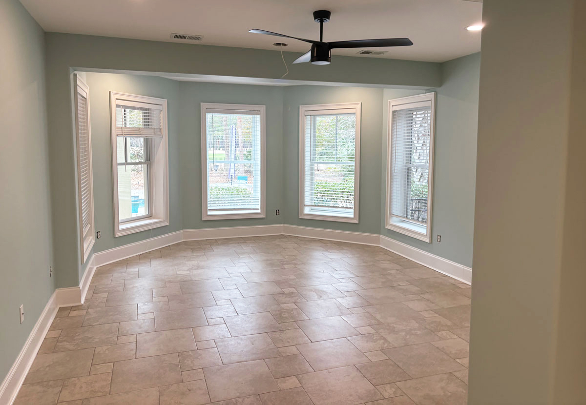 Finished kitchen with professionally painted and refinished cabinets by Camellia Painting Company