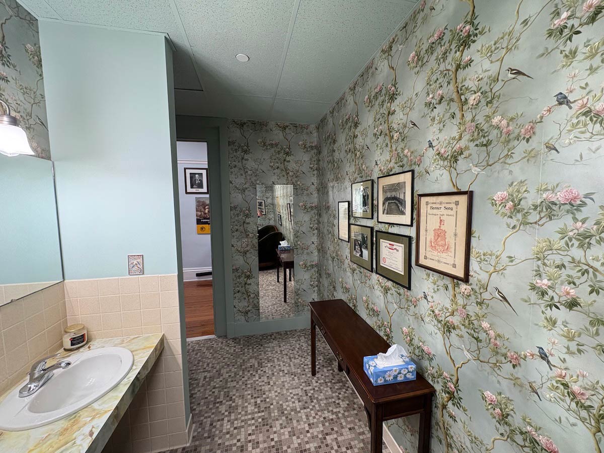 Floral Wallpaper Installation in Women’s Restroom