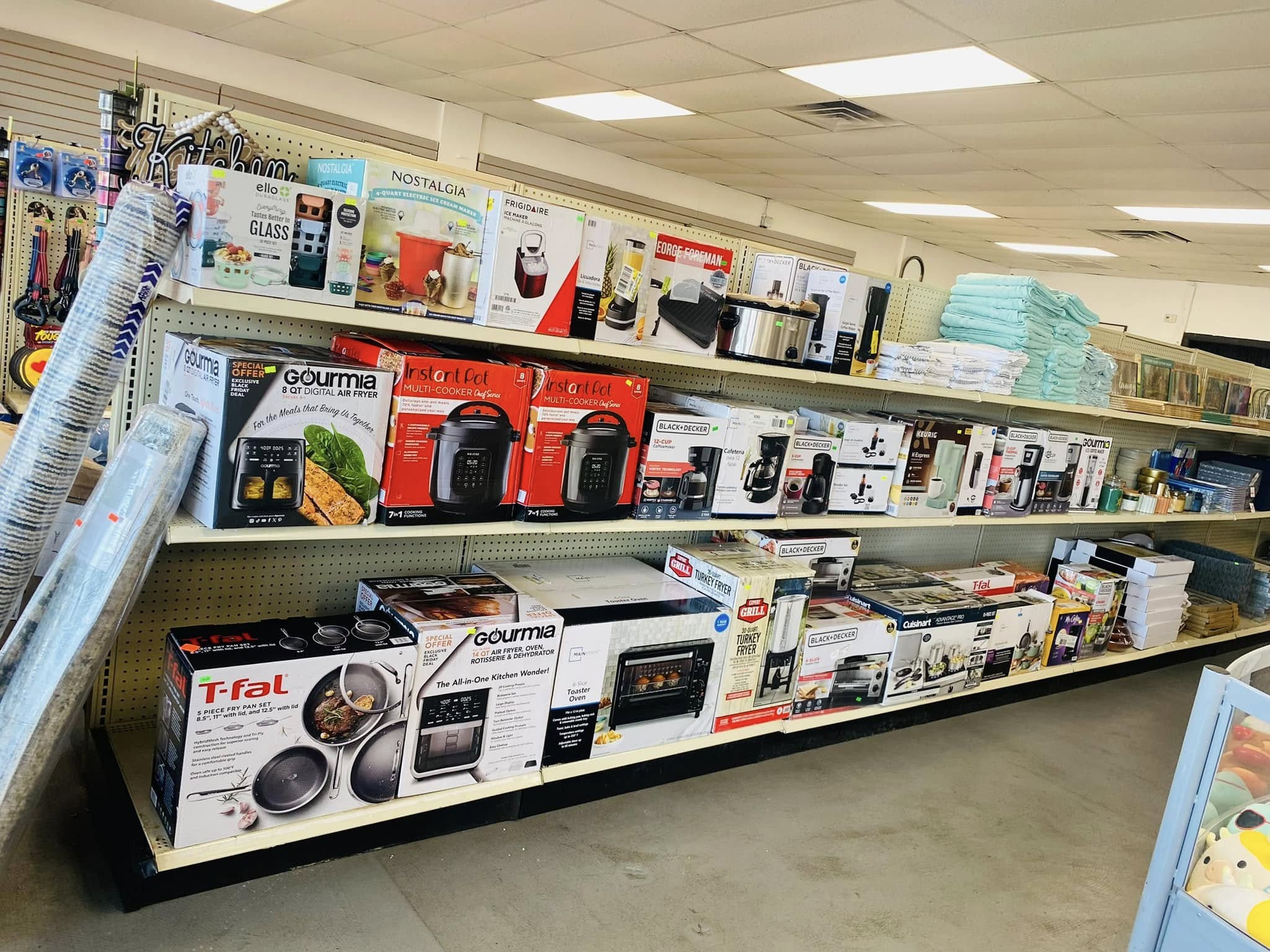 Half off store. 50% percent off everything. Second time around store. The store, half off retail.