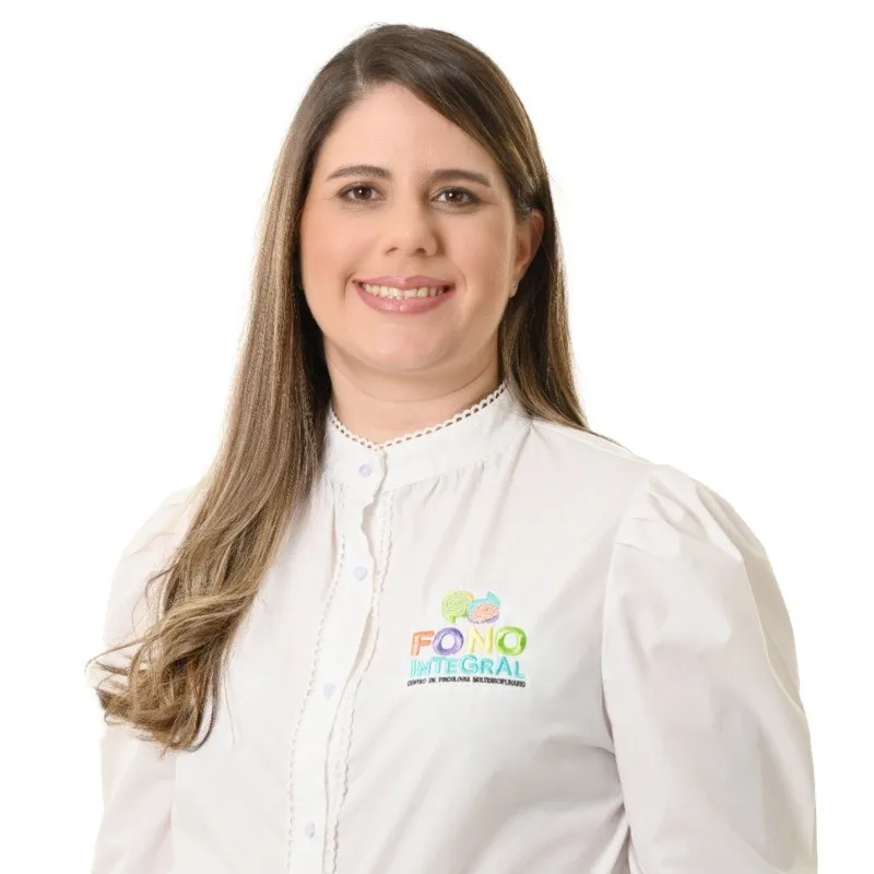 Portrait of a smiling female specialist in a white top with the company logo.