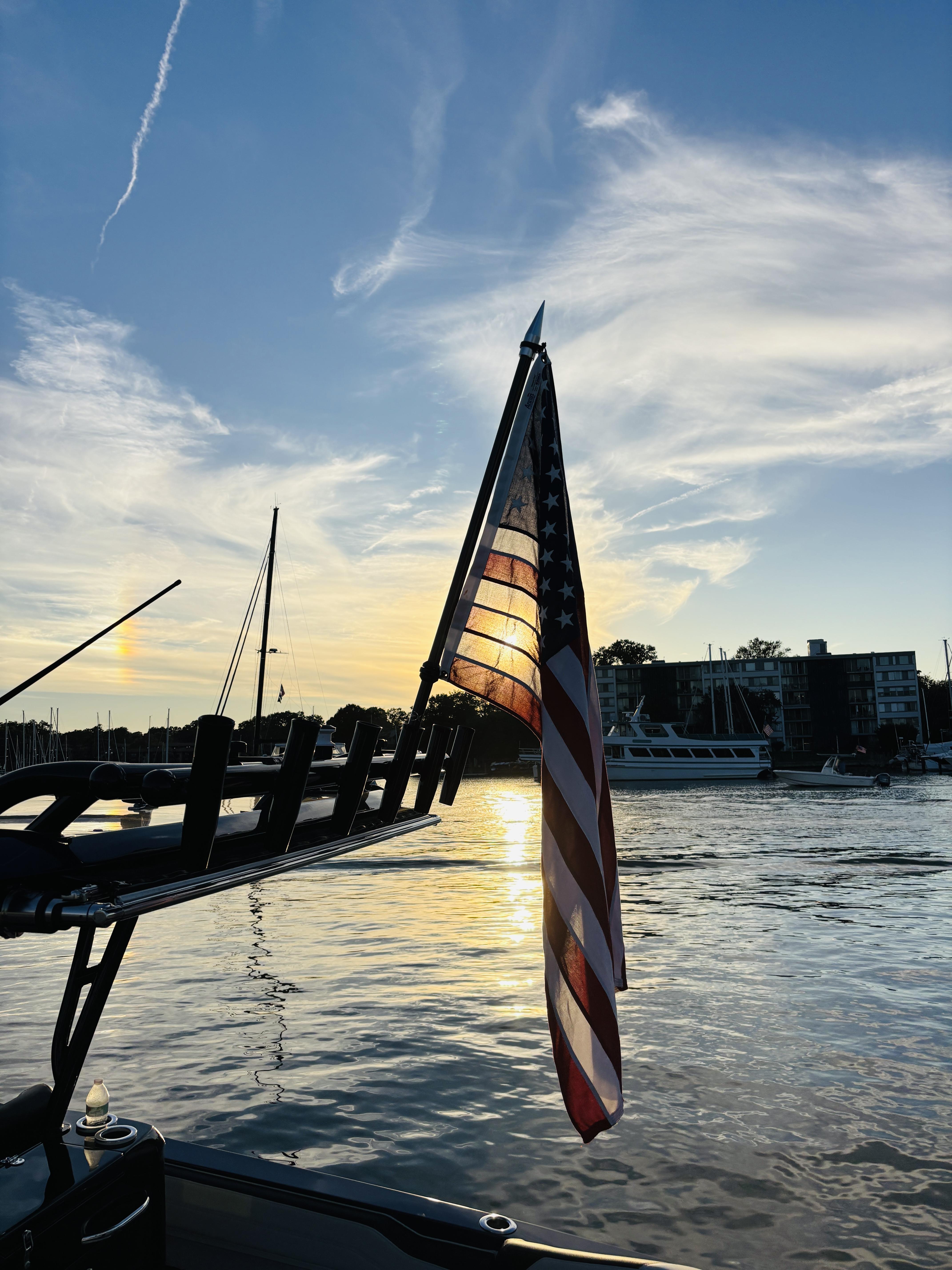 Stronger Maryland - American Flag on a powerboat at sundown