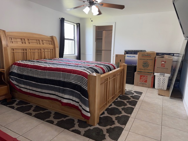 Bedroom located inside the 3 bedroom home at 755 SW Babbit Dr in Port St Lucie Florida.