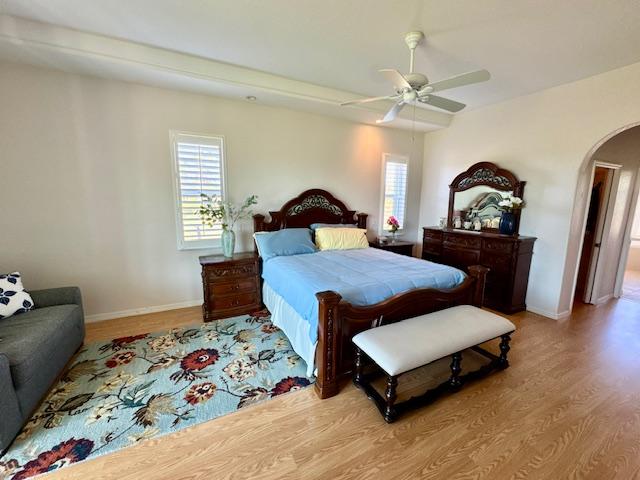 Master bedroom with natural light in Punta Gorda home.
