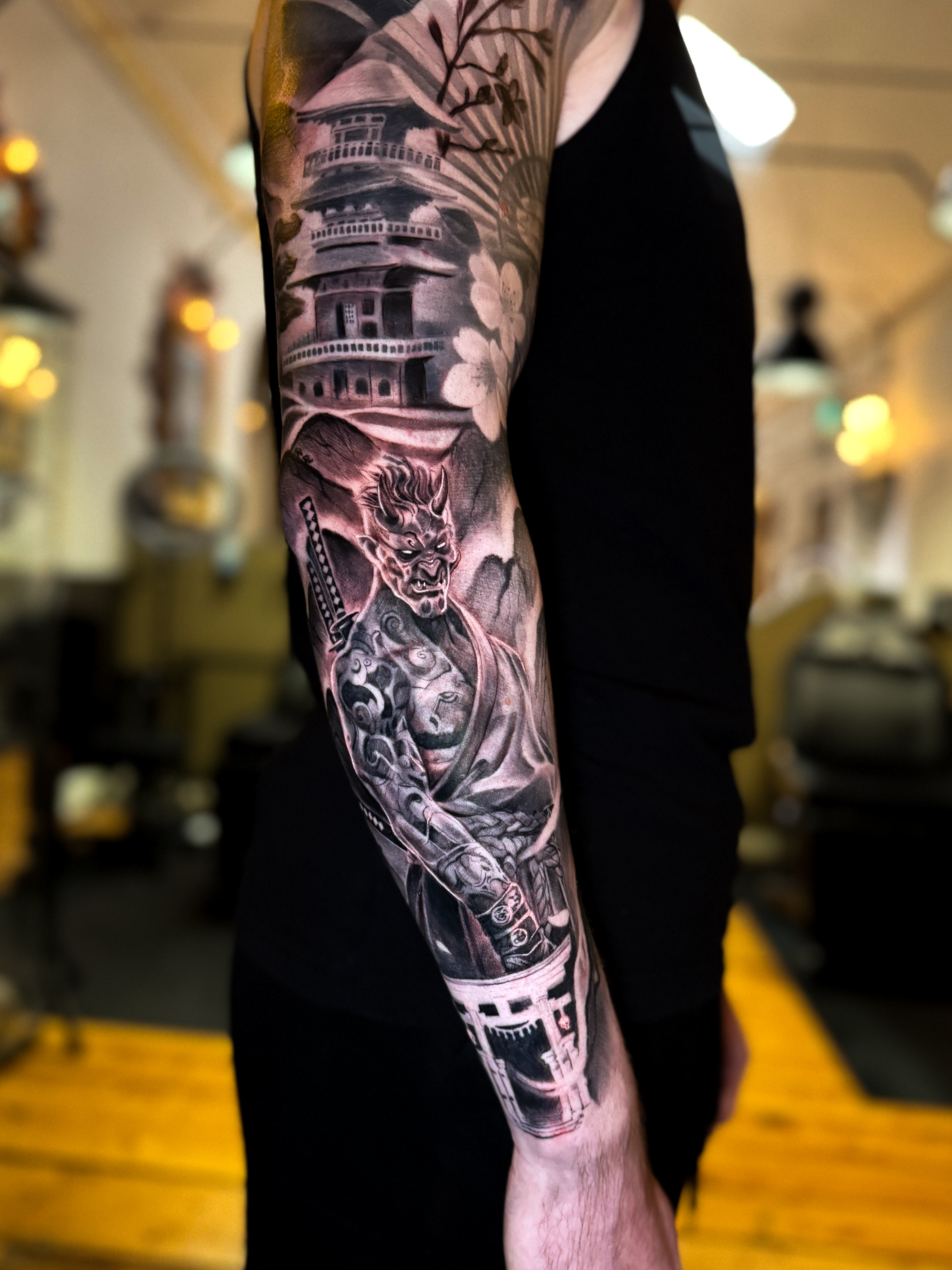 person with tattoo on right arm