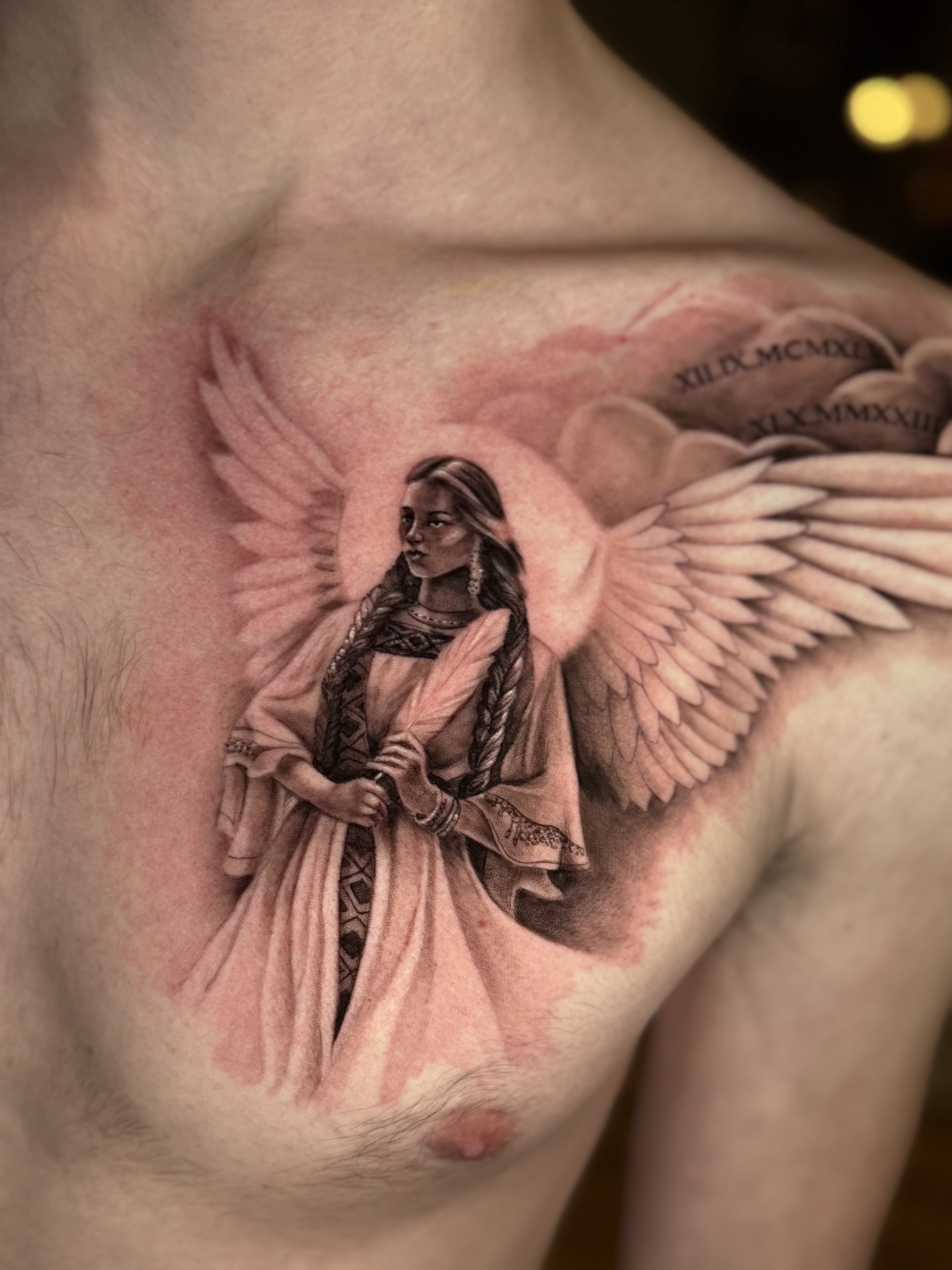 person in blue denim shorts and white nike sneakers standing on gray concrete floor