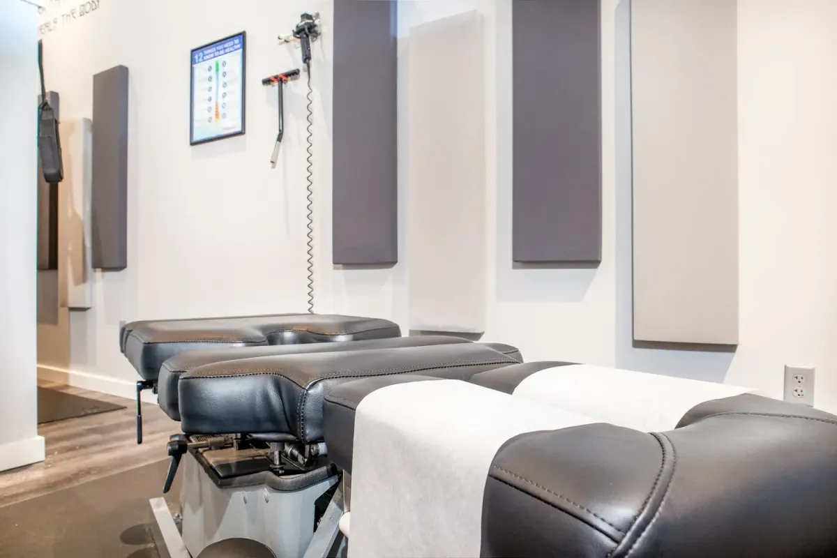 SpineEase 3000 spinal decompression table in a bright clinic room
